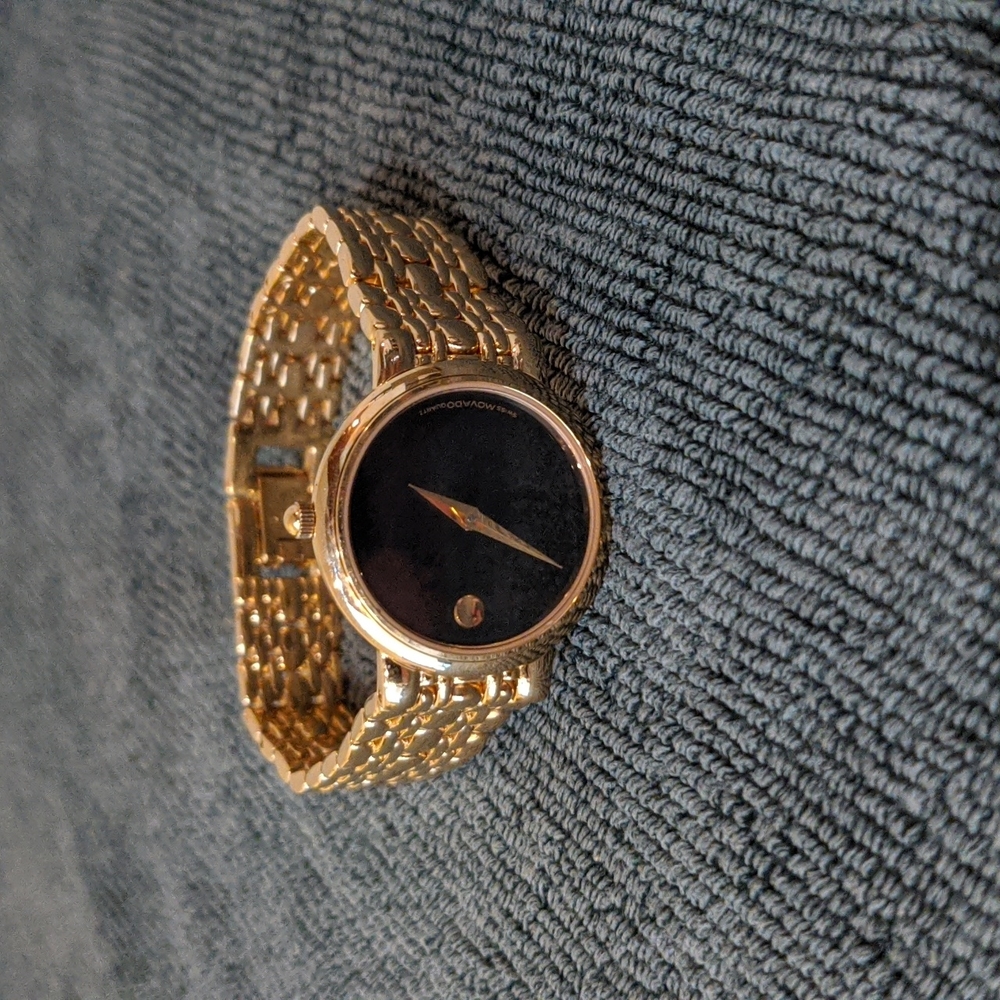 Movado Mens Watch with Gold-tone and Black Dial.